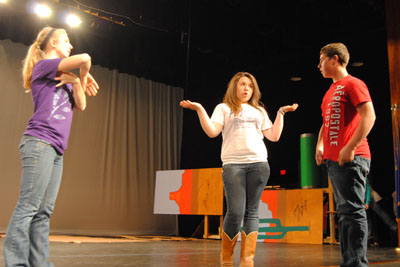 Junior Hannah Thill, senior Mariah Hickman and sophomore Bailey Rankin act out a scene from The Little Mermaid.