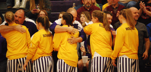 Lady Rams hug their coaches from senior night.