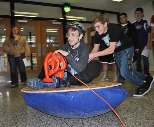 Senior Britton Mahler takes a go at hover crafting.
