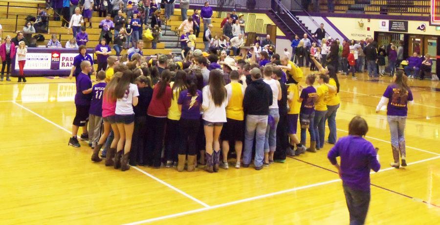 Ram+fans+gather+together+in+the+center+of+the+court+to+congratulate+the+Lady+Rams+on+their+Sectional+Victory%21+++