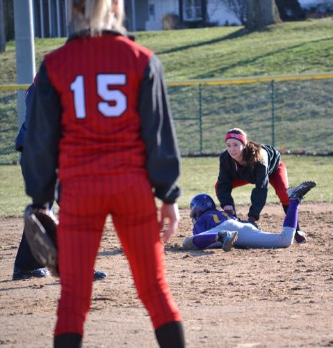 Morgan Kingston, number eleven, slides to second base for the call of being safe. 