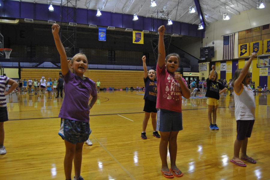 Throop students preform in practice for the high school cheerleaders.