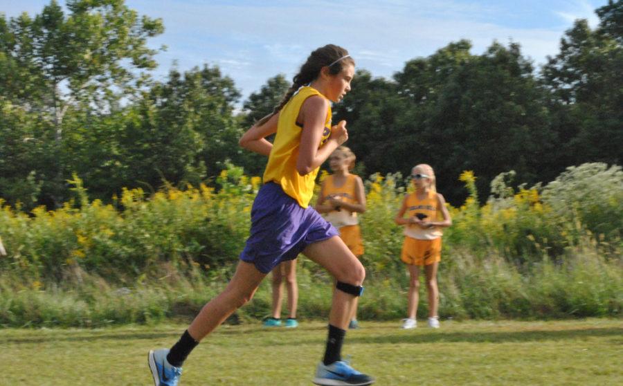 Eighth grader Ali Kerby heading for the finish line.