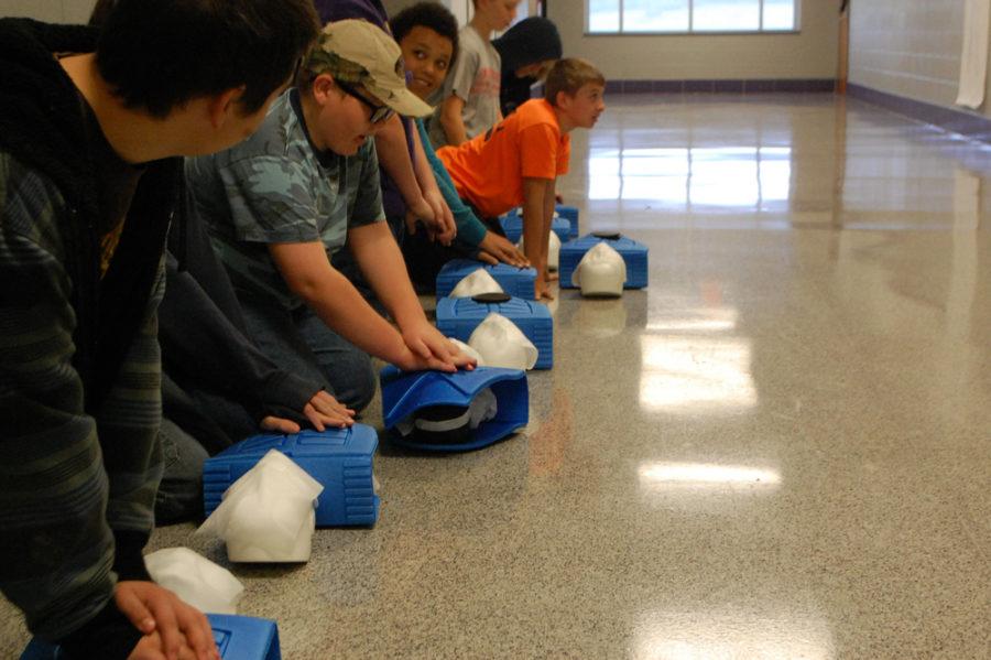 Dusty Coles 4th period Junior High class learns to perform CPR.