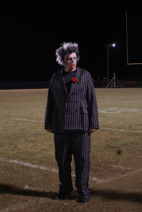 Superintendent Mr. Brewster stand on the football field after the zombie run looking awesome. 