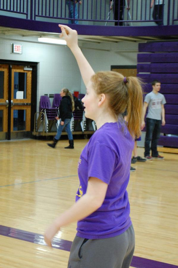 Eighth grader Harli Wilder tries to get her teammate’s attention to get the ball during junior high lunch recess. 