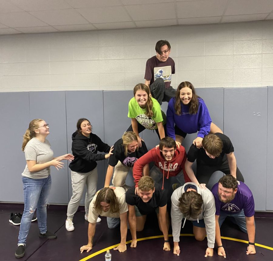 Seniors in Math Teacher Paul Bosley’s 
homeroom stack up in a human pyramid in the wrestling room.