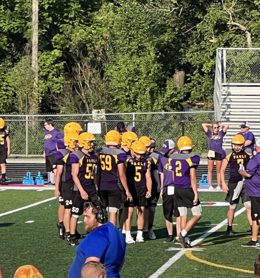 The varsity football team plays against 
Owen Valley at their scrimmage on July 19.