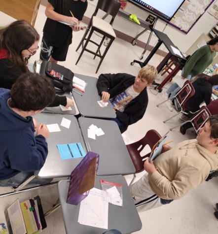 Junior high students play games during their STEM activities.