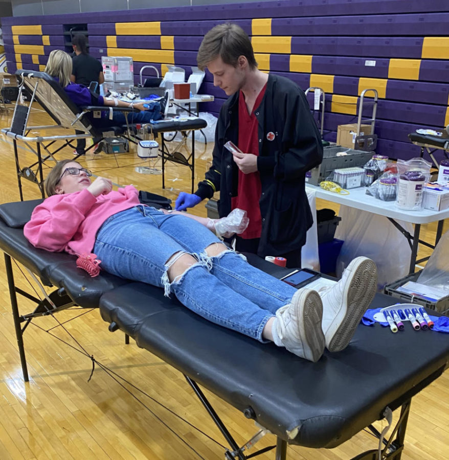 Junior Stella Windhorst donates her blood.