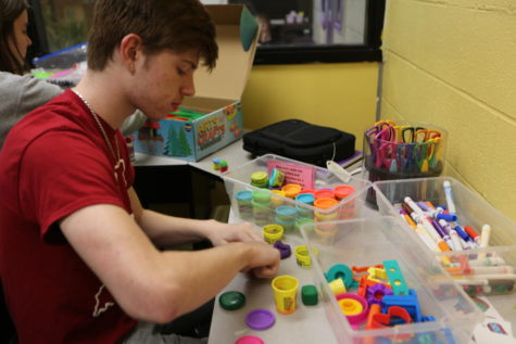 Junior McKinley Stewart sculpts with
Play-Doh in the Makerspace
