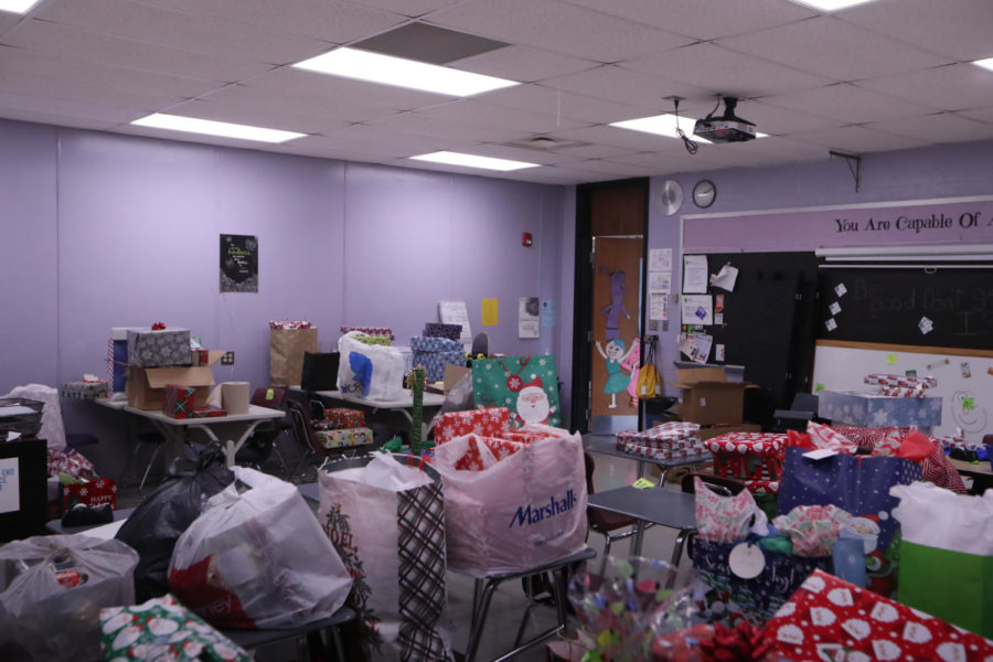 Gifts for Angel Tree recipients fill the PACT room desks awaiting pick-up.