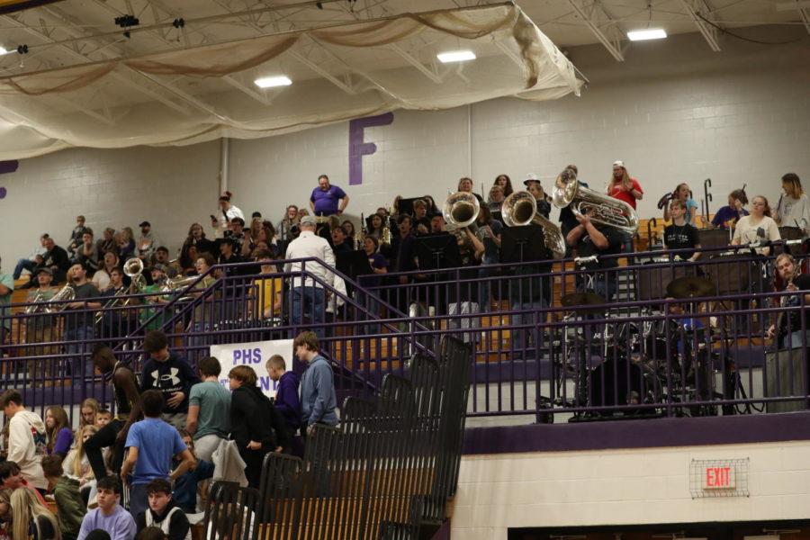 The Pride of Paoli Pep Band plays at a boys basketball game.