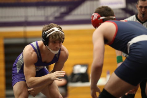 Senior Austin Benales prepares for his match at the Paoli Invitational on January 7