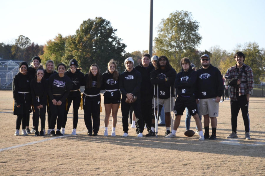 The senior Powderpuff Football team poses for a photo after a win.