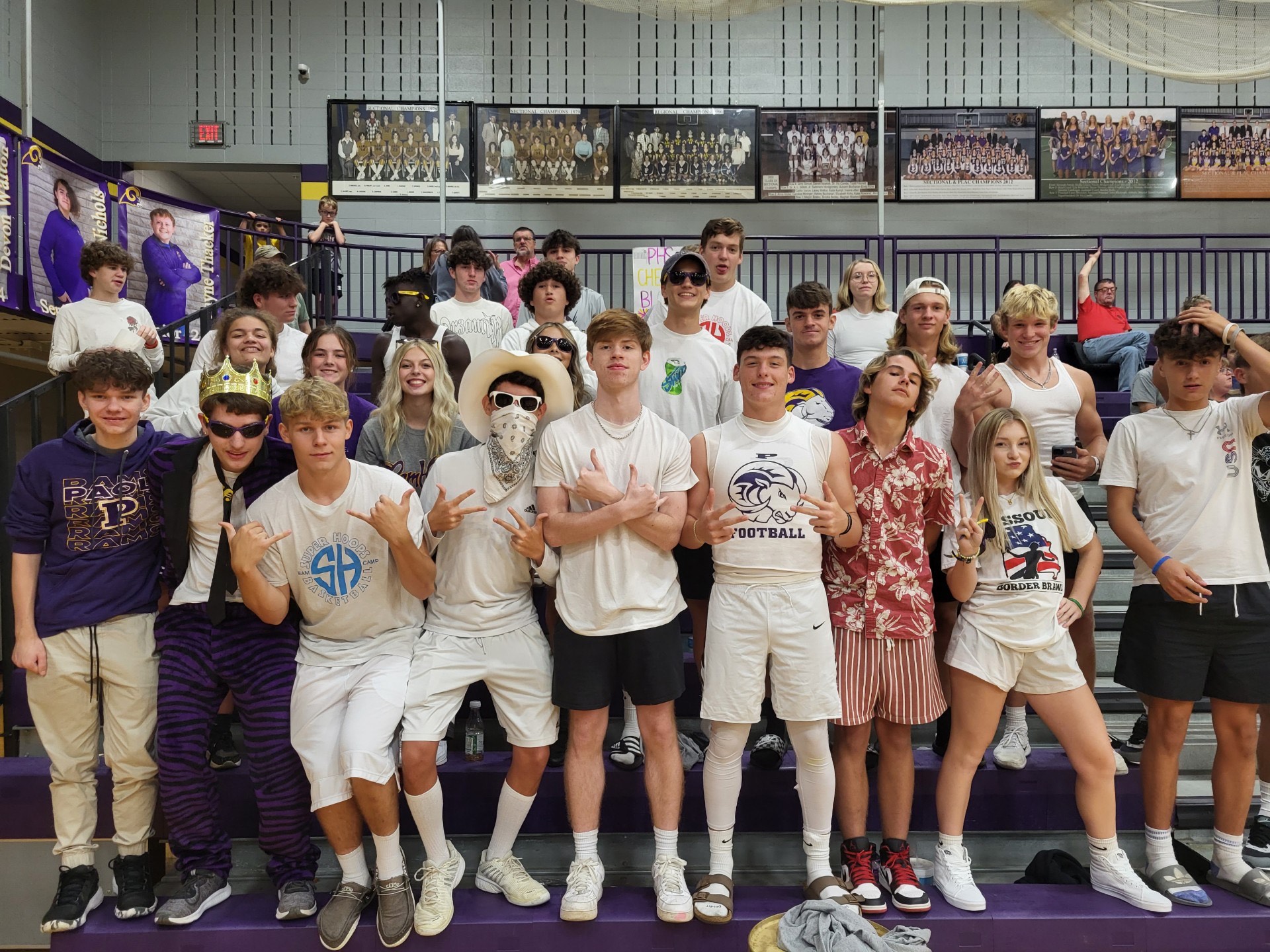 Our White Out cheer block poses for a picture.