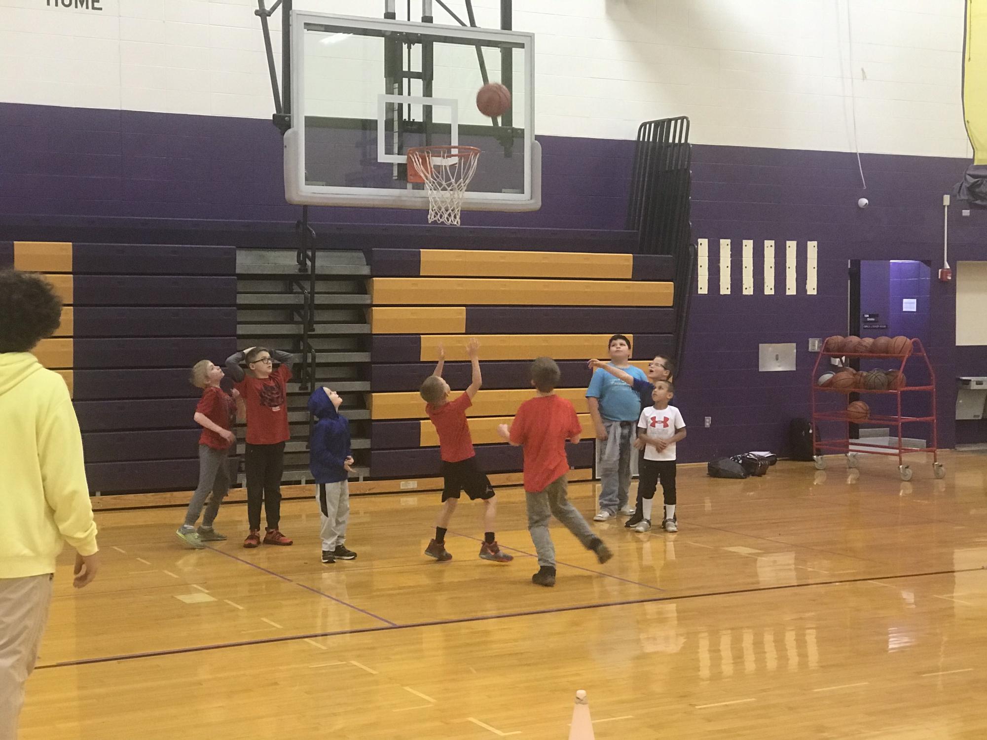 Throop Elementary students participate in Biddy Ball by playing basketball. 