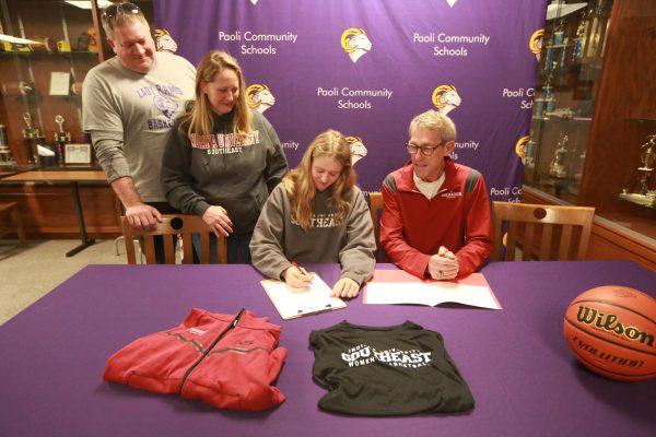 Senior Carley Higgins signs on to play for the Indiana University Southeast Women’s Basketball team. Higgins signs on with support from her parents Melissa and Chris Higgins and IUS coach Robin Farris.