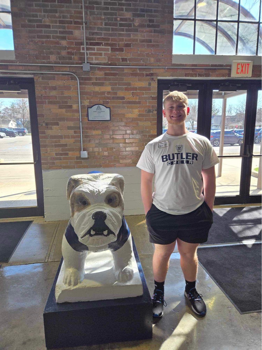 Busick poses with the Butler mascot during his visit to the campus for a stunt clinic. 