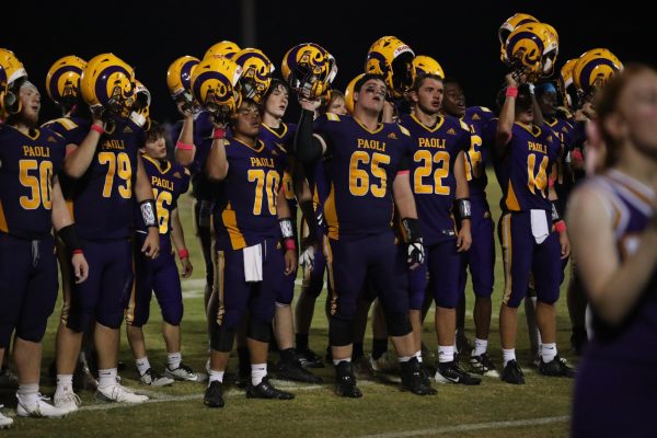 Senior Peyton Baker, sings the PHS fight song after winning the game.
