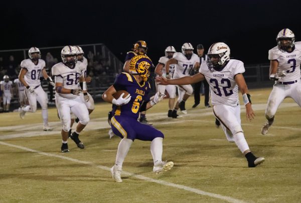 Senior Garrett Hickman runs the ball