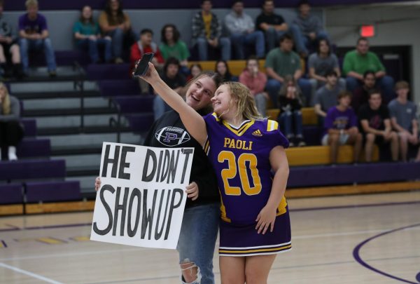 Senior homecoming candidate Keeley Scott and Chloe Smith take a picture together.