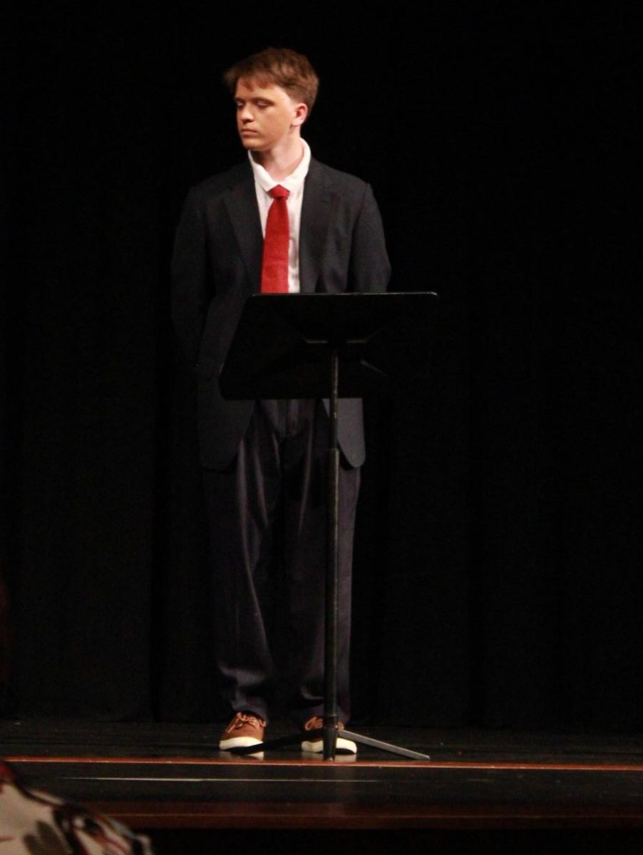  Sophomore Garrett Cook playing the role as Donald Trump for his skit.
