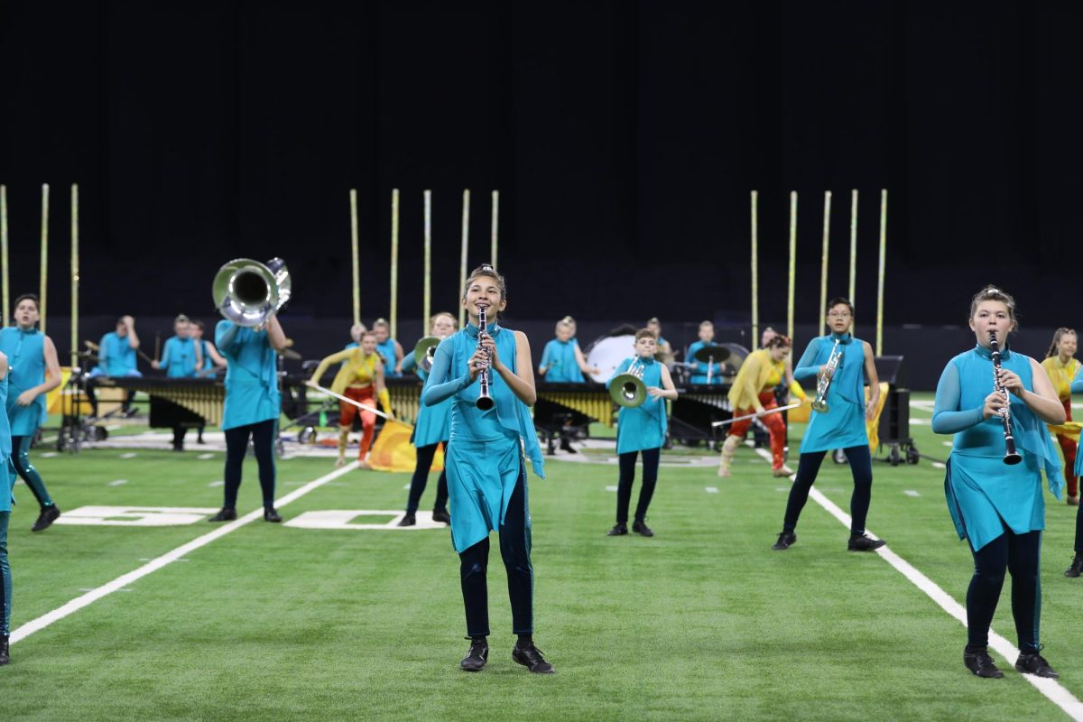 The band performs at State Finals in Lucas Oil Stadium. 