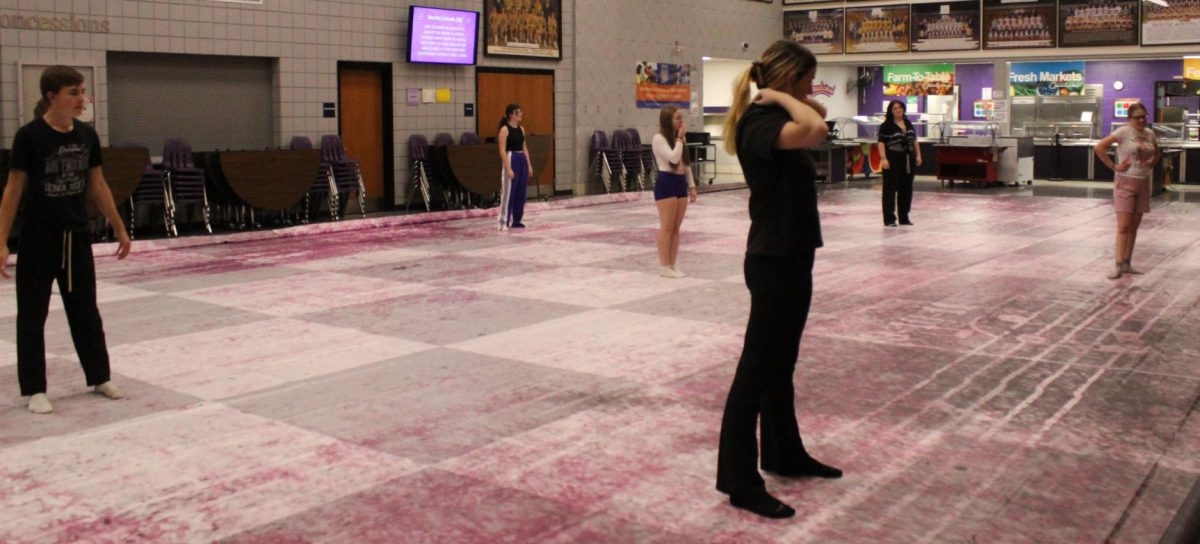 The guard get into their block to stretch.