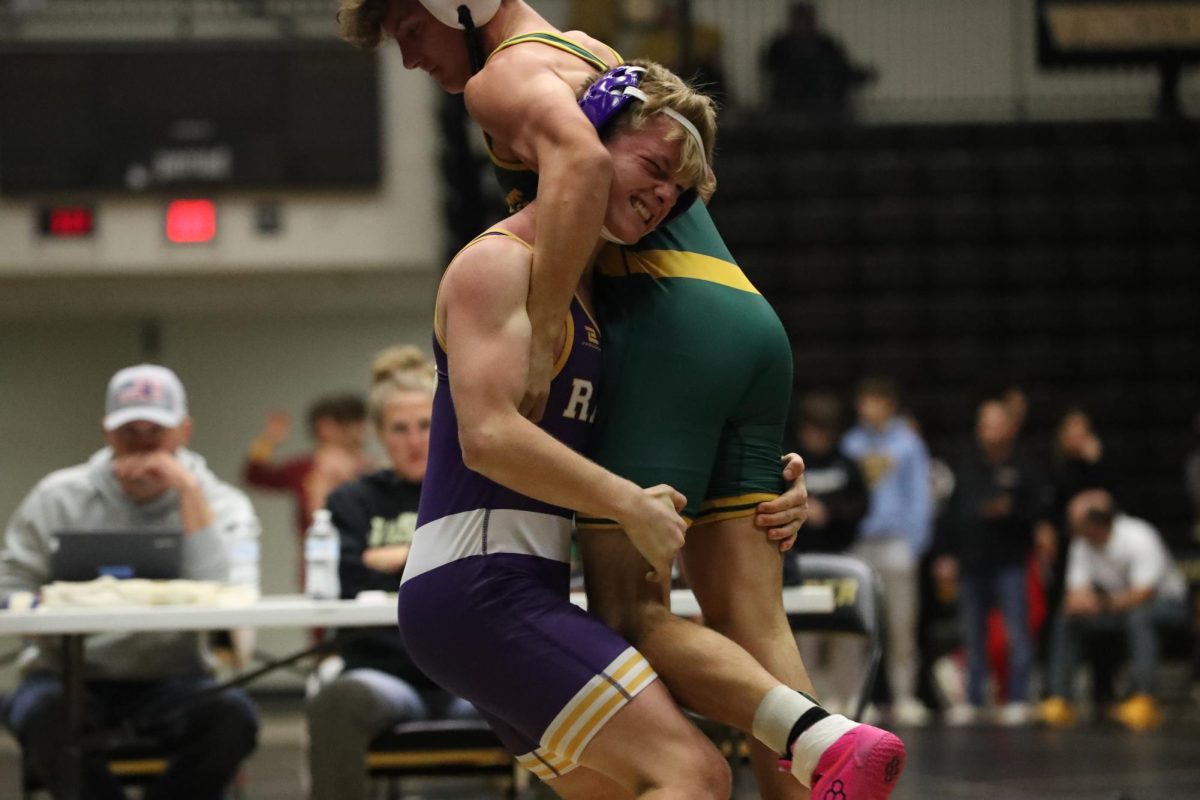 Junior Kolt Bonta picks up an opponent during a match in the Jasper Invite. 