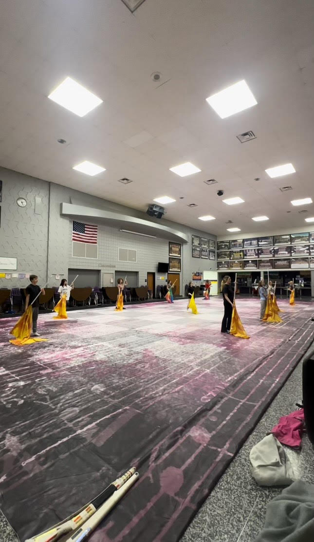 Members of the Winter Guard work to learn their new routine.
