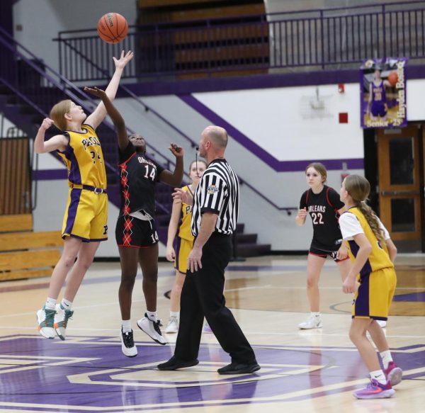 Seventh grader Teya Kemenda tips the ball off.