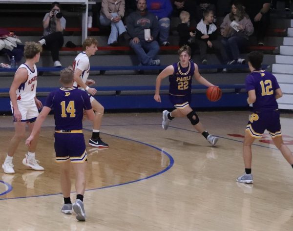 Junior Cooper Spires, looks to pass the ball.