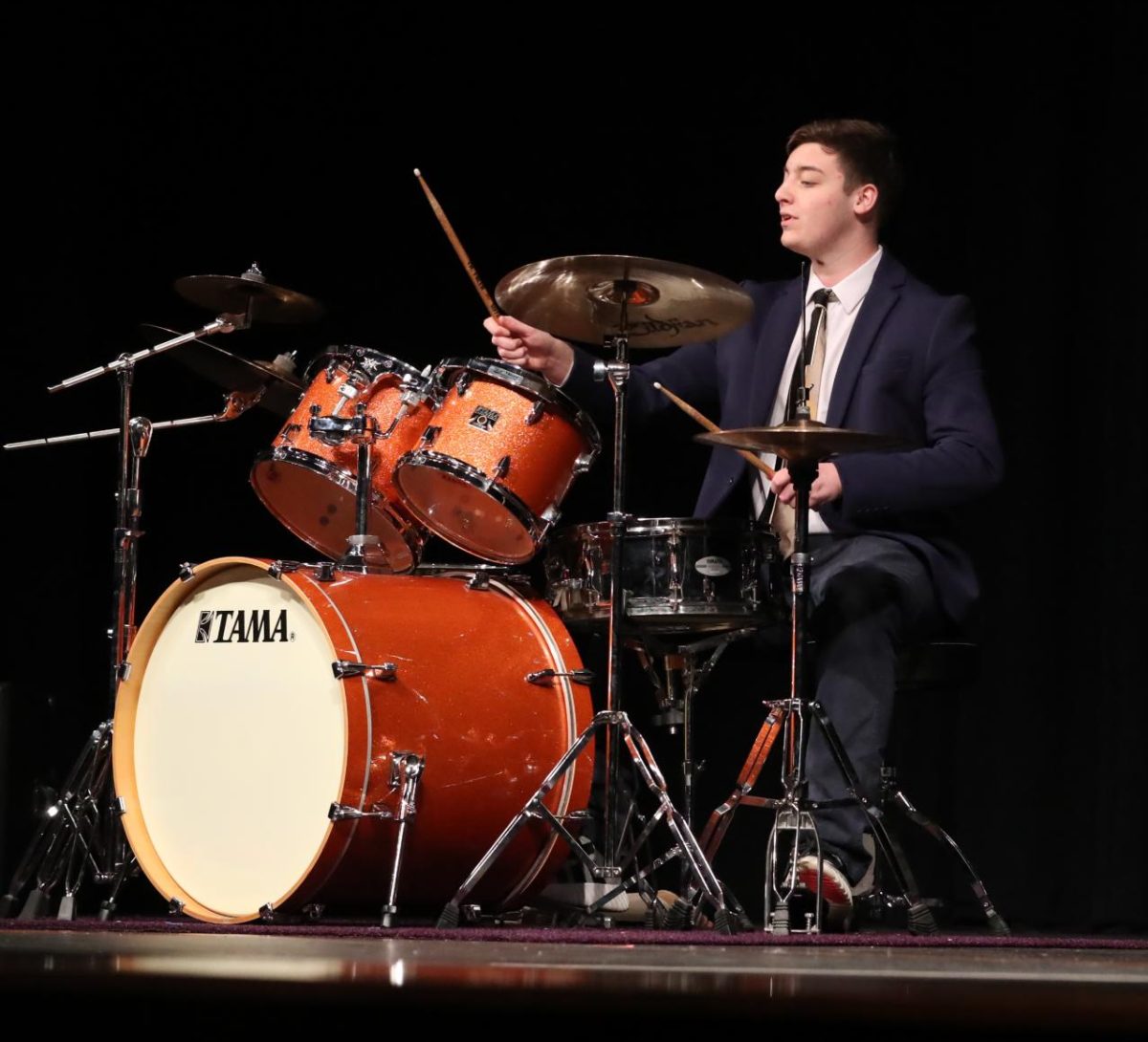 Junior Cannon Lambdin plays a solo on the drums.