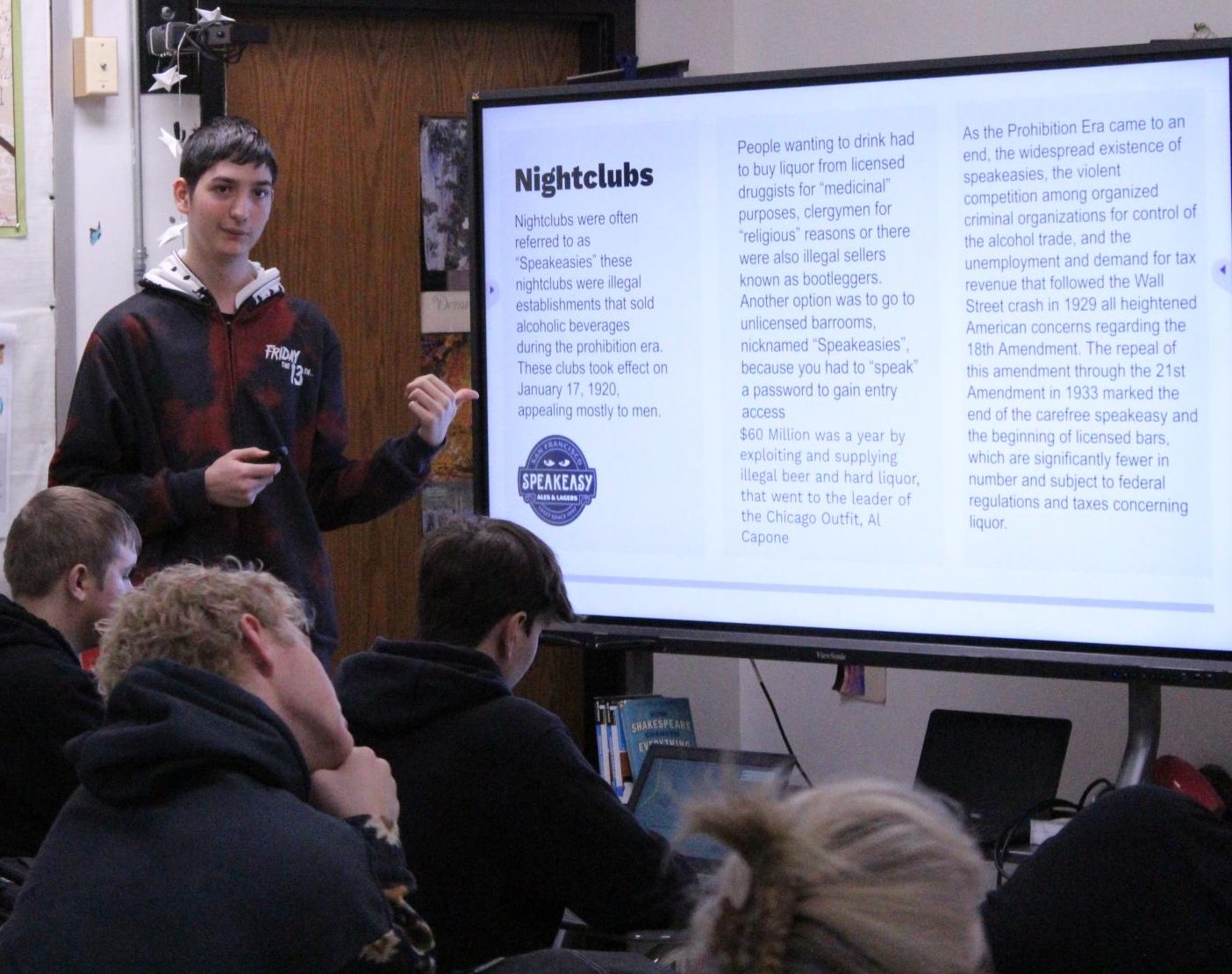  Junior William Collier presents information about nightclubs to his English 11 class.