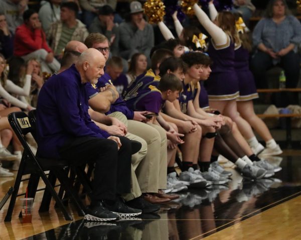 Assistant Coach Mike Browns watches the action during the JV game against Springs Valley. 