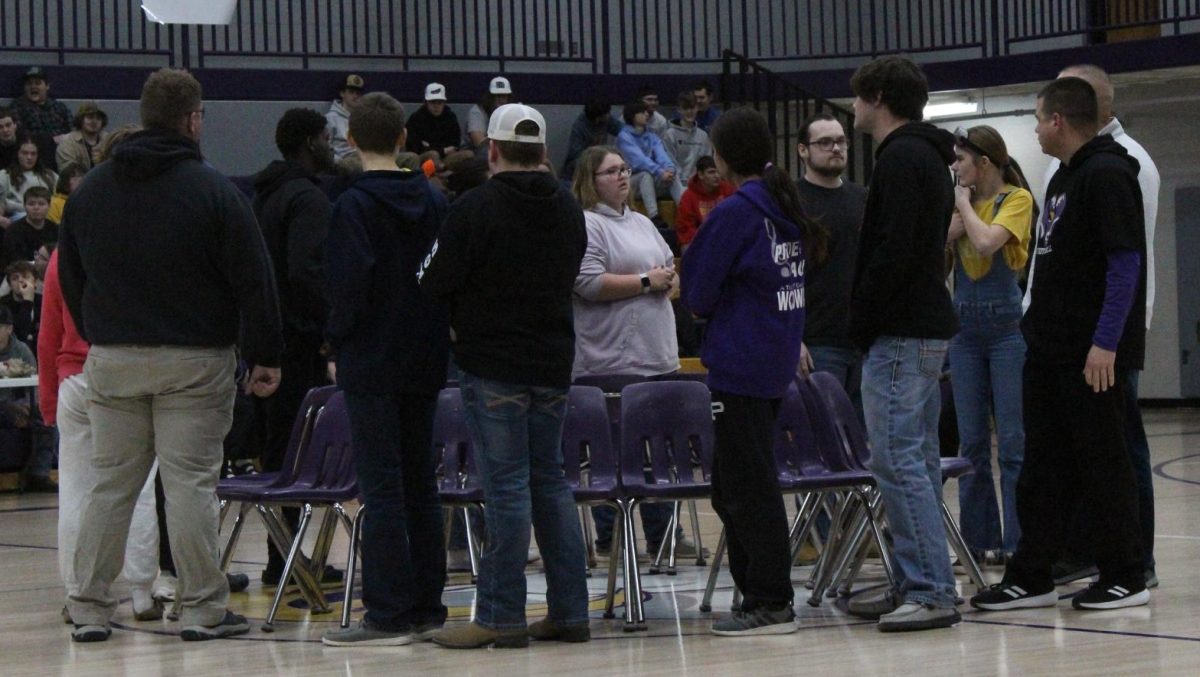 Staff and students from each grade play musical chairs.