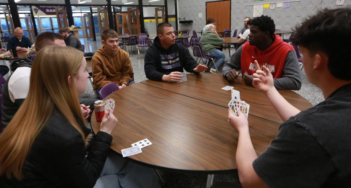  Mr. Reynolds talking to Sophomore Chad Sullivan.
