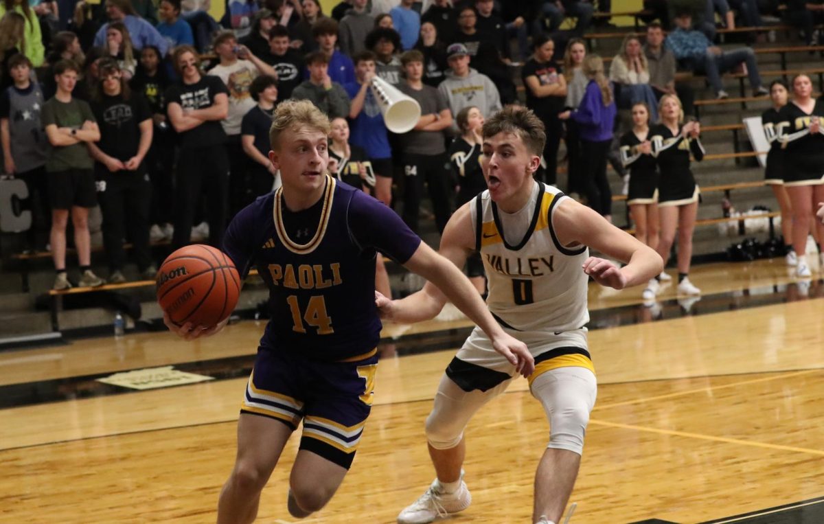 Senior Fletcher Cole makes a break against a Blackhawk opponent earlier in the season. 