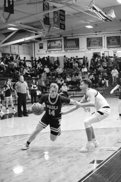 Senior Fletcher Cole drives past a Springs Valley defender.