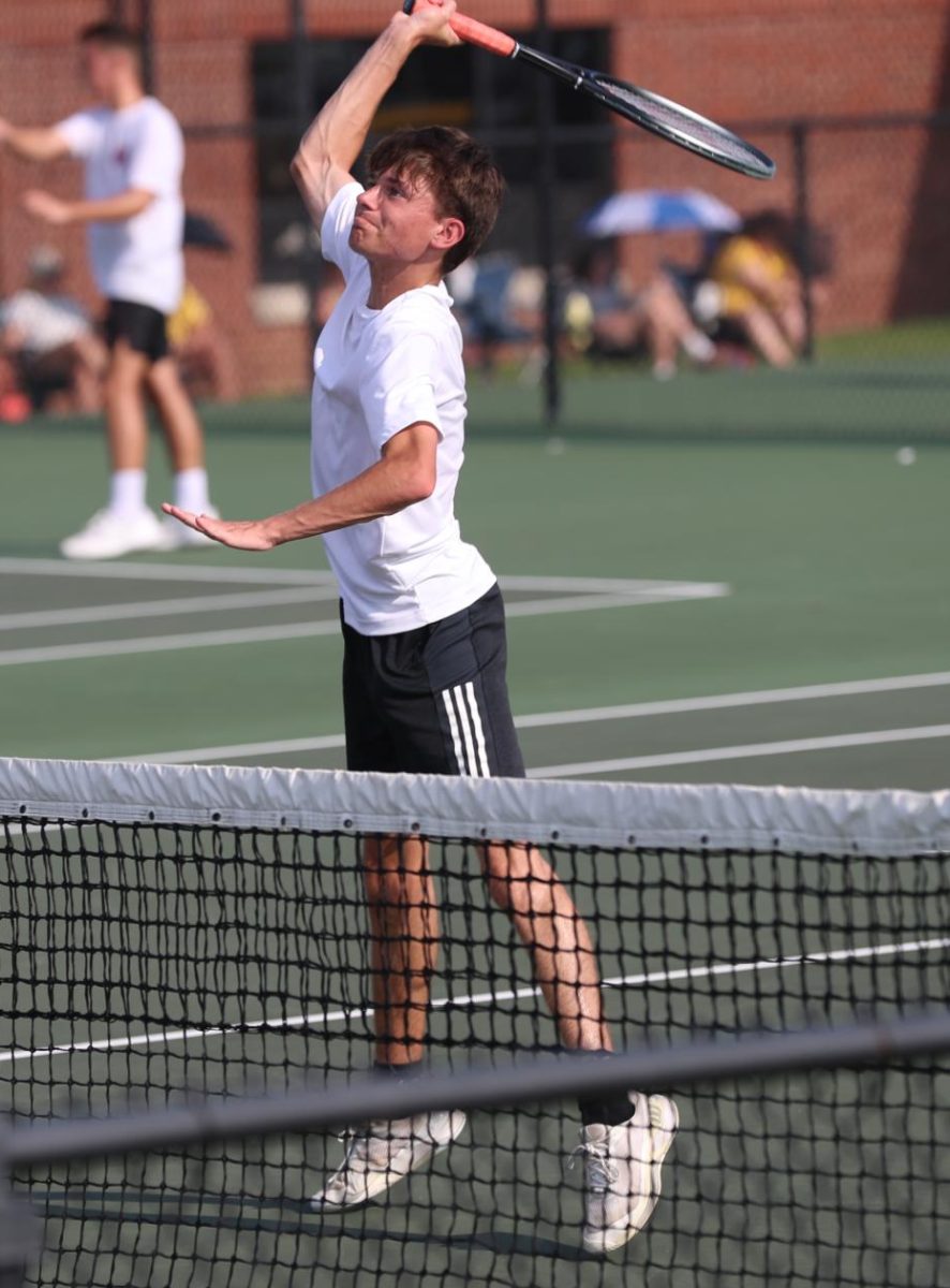 Senior Dakota Mousty prepares to slam the ball. 