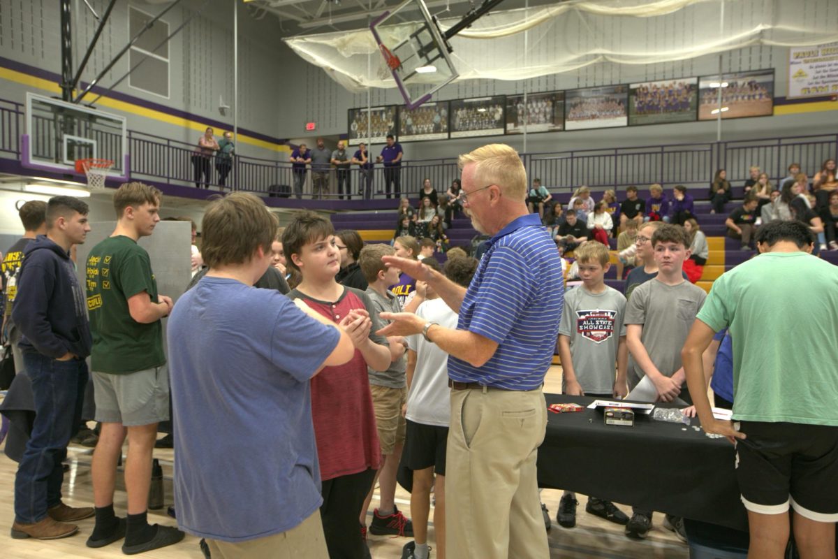 Chris Lindley talks to kids about the Games Club.