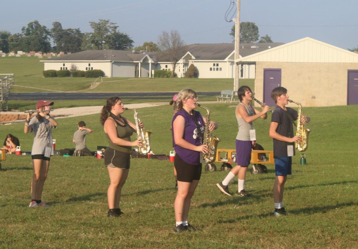 Band members practice after school. 