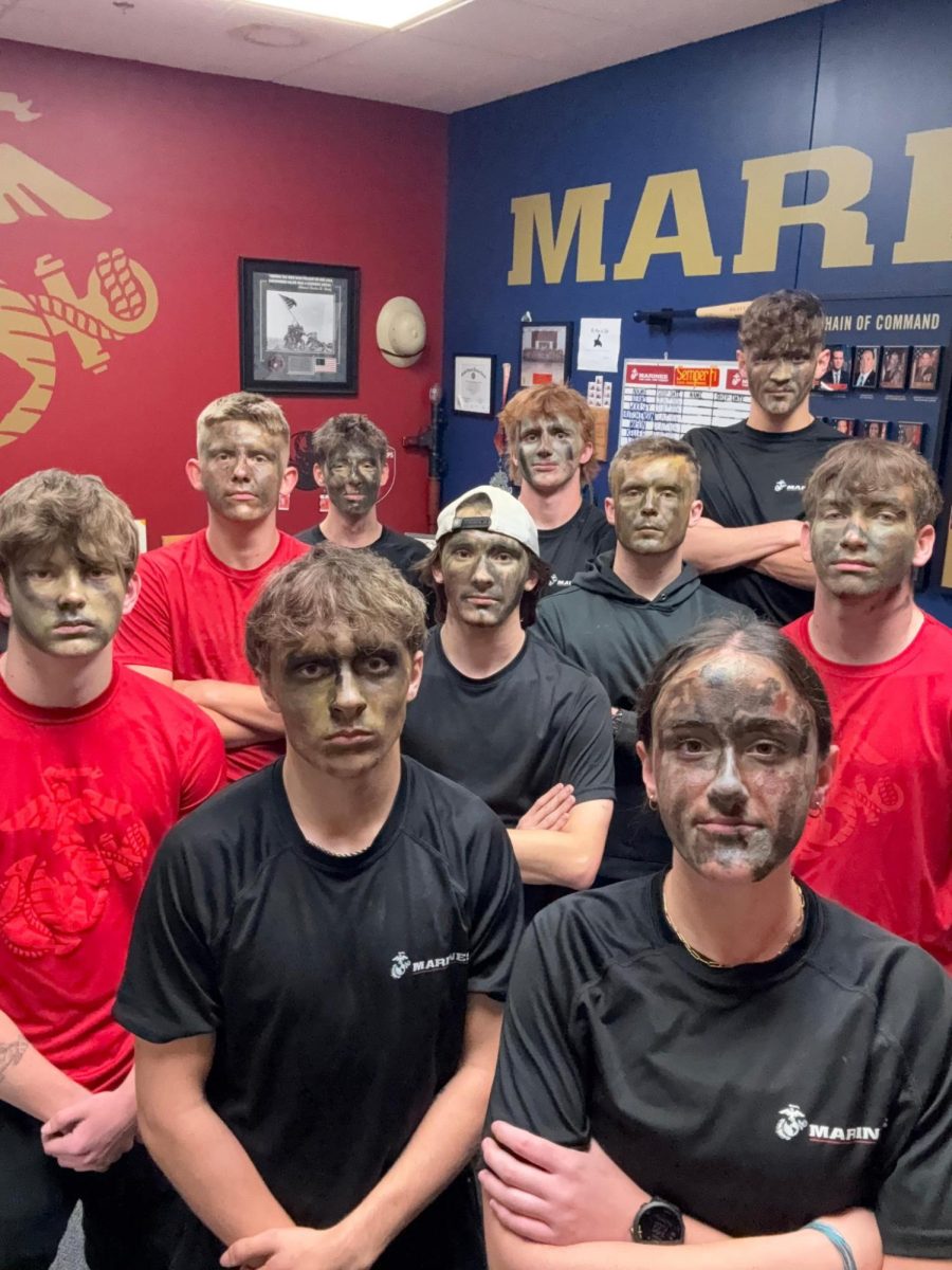 Riley Shelton is pictured with others training with the Marines.