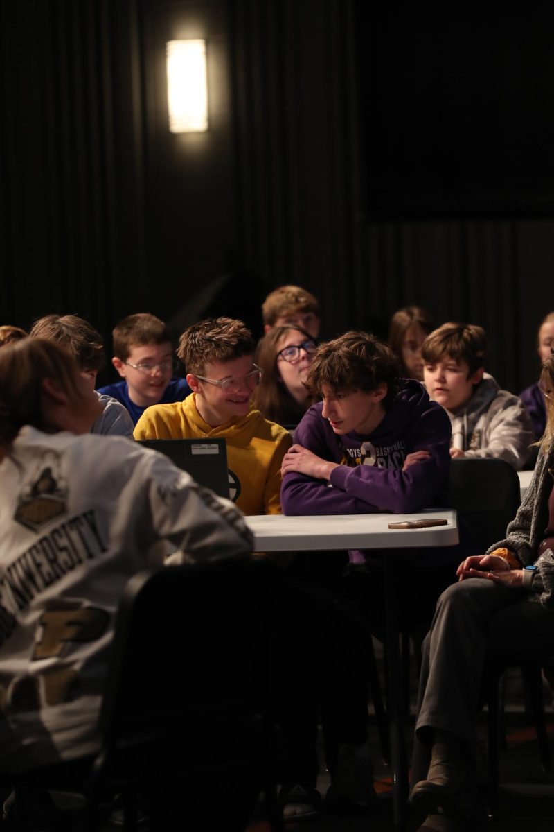 Freshmen Camden Walton and Peyton Gammon discuss a question during the America 250 Kahoot contest.