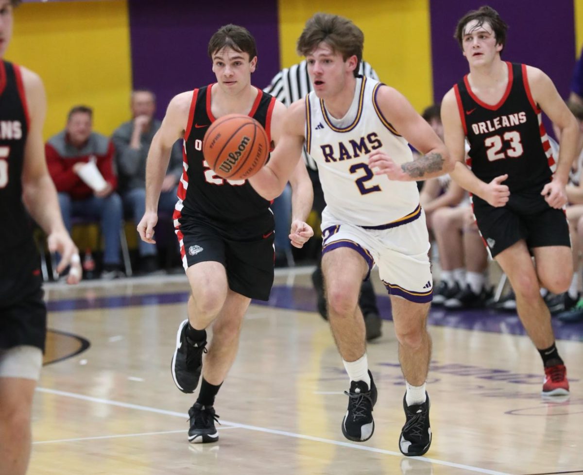 Senior Treighlin Minton brings the ball down the floor against the Bulldogs.