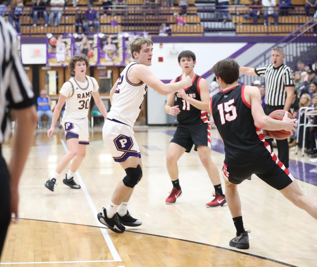 Senior Cooper Spires faces an Orleans opponent. 