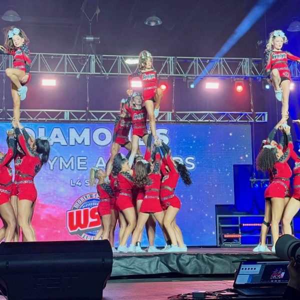 Senior Taylor Morgan performs with her Gym Tyme team at WSF (World Spirit Federation) in Louisville in December.
